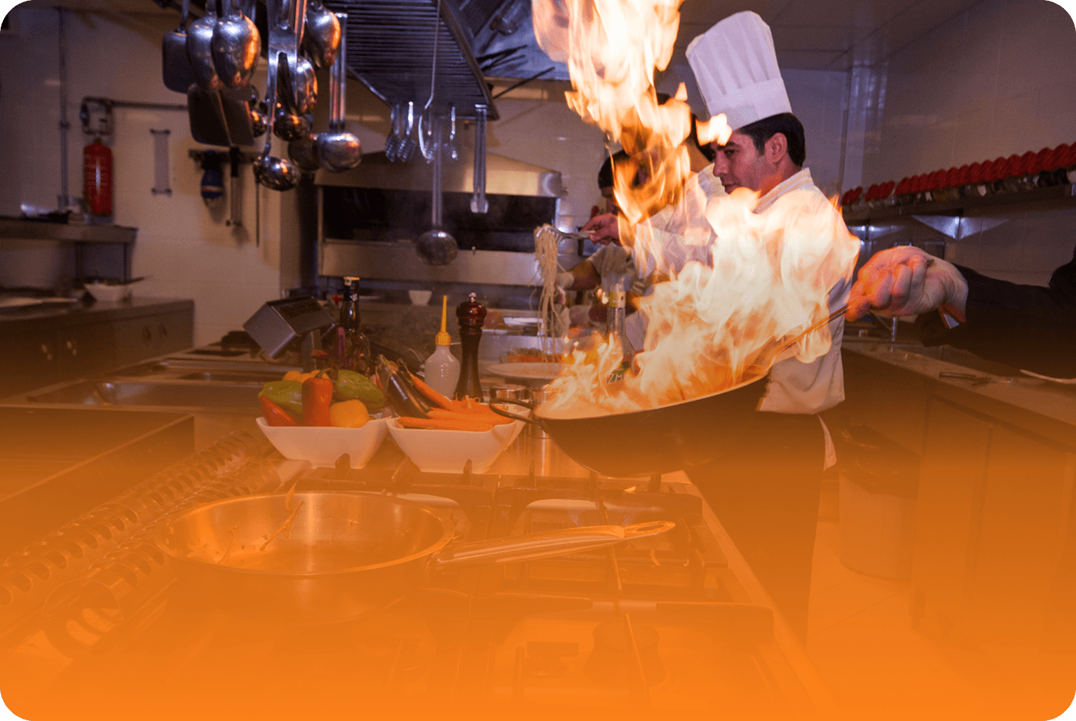 Chef cooking with flame